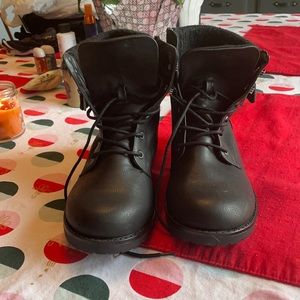 Size 8.5 black Torrid combat boots. Brand new!